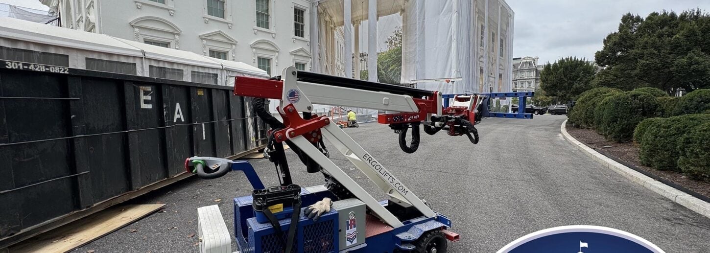 Skyreach technician operating an Ergo Lifting Technologies glass manipulator on-site at the White House during restoration work